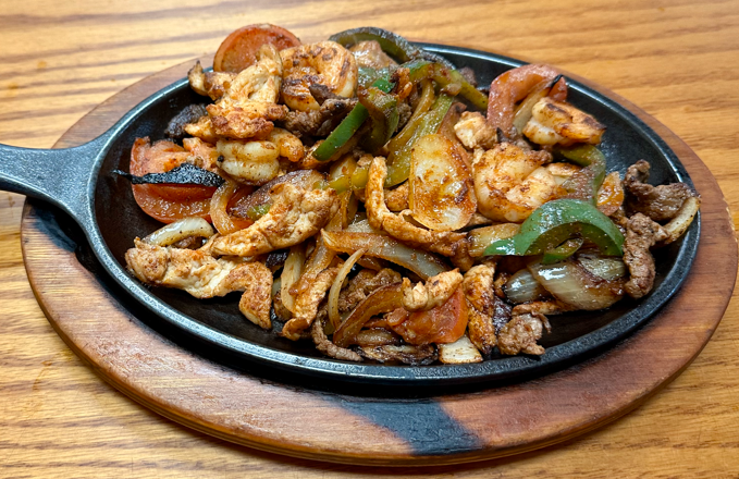 44. Steak, Chicken and Shrimp Fajitas 